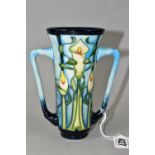A MOORCROFT POTTERY 'CALLA LILY' LOVING CUP, of tapering form, in Calla Lily pattern by Emma