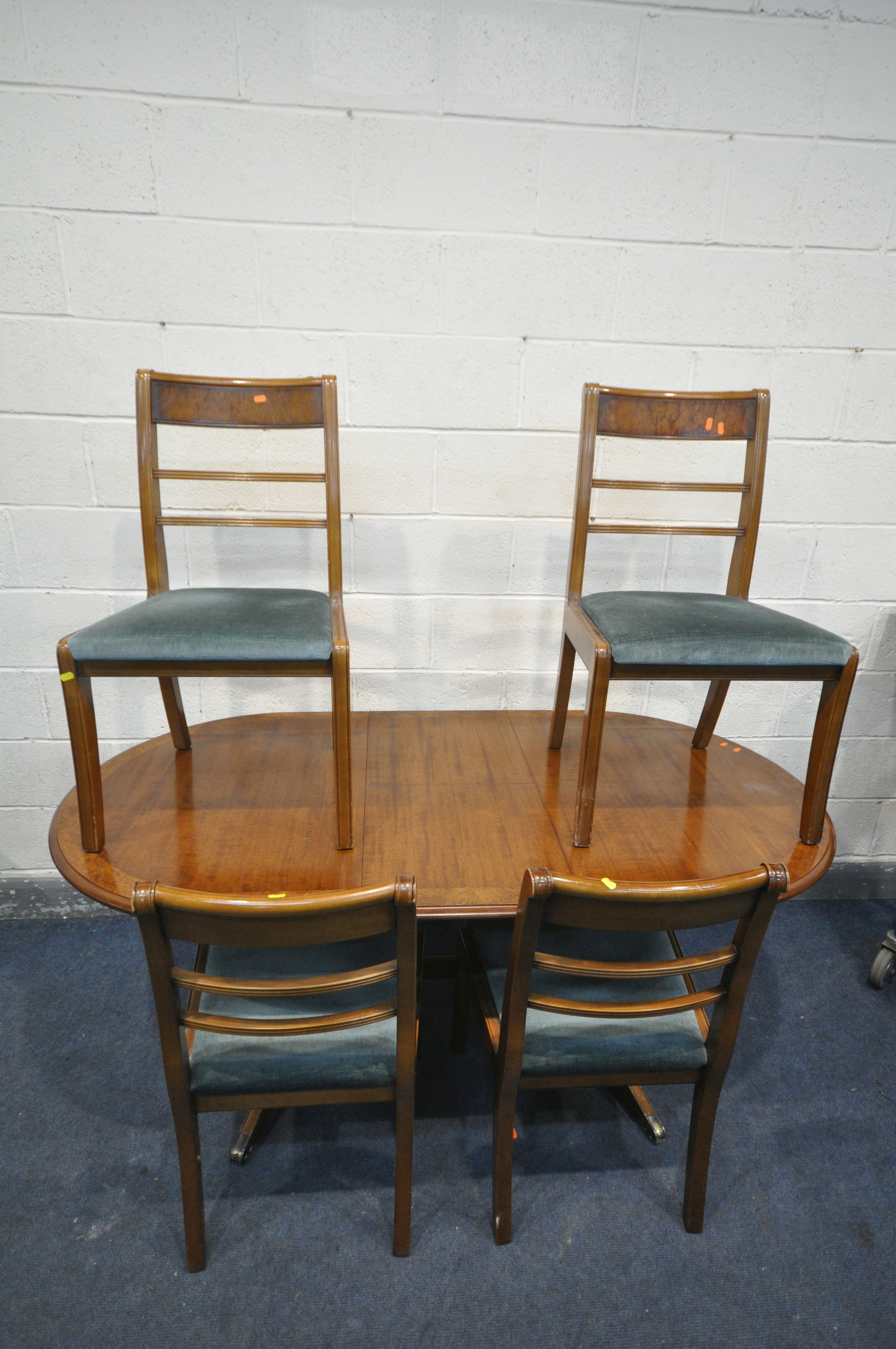 A 20TH CENTURY NATHAN MAHOGANY AND BURR ASH OVAL EXTENDING DINING TABLE, open length 175cm x