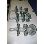 THREE FRENCH SEDIVER ELECTRICITY ISOLATORS, with green glass discs 17cm in diameter, total length
