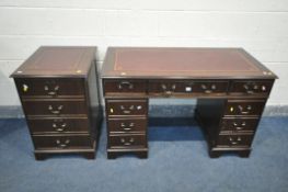 A MAHOGANY PEDESTAL DESK, with a red leather writing surface, with an arrangement of drawers,