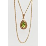 A 9CT GOLD PERIDOT PENDANT NECKLACE, the pendant of a pear drop shape, collet and claw set pear