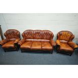 A BROWN LEATHER THREE PIECE LOUNGE SUITE, comprising a three seater sofa and a pair of armchairs (