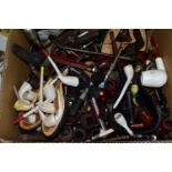 A BOX OF PIPES, to include over forty pipes, part pipes and accessories, clay pipes including an