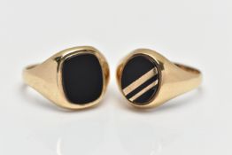 TWO 9CT YELLOW GOLD ONYX SIGNET RINGS, the first set with an oval onyx panel with yellow metal