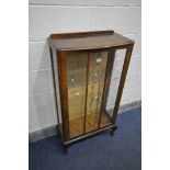 A WALNUT SINGLE DOOR CHINA CABINET, width 60cm x depth 30cm x height 112cm (condition:-surface