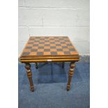 A MAHOGANY GAMES PLAYING TABLE, including chess and backgammon piece, 51cm cubed