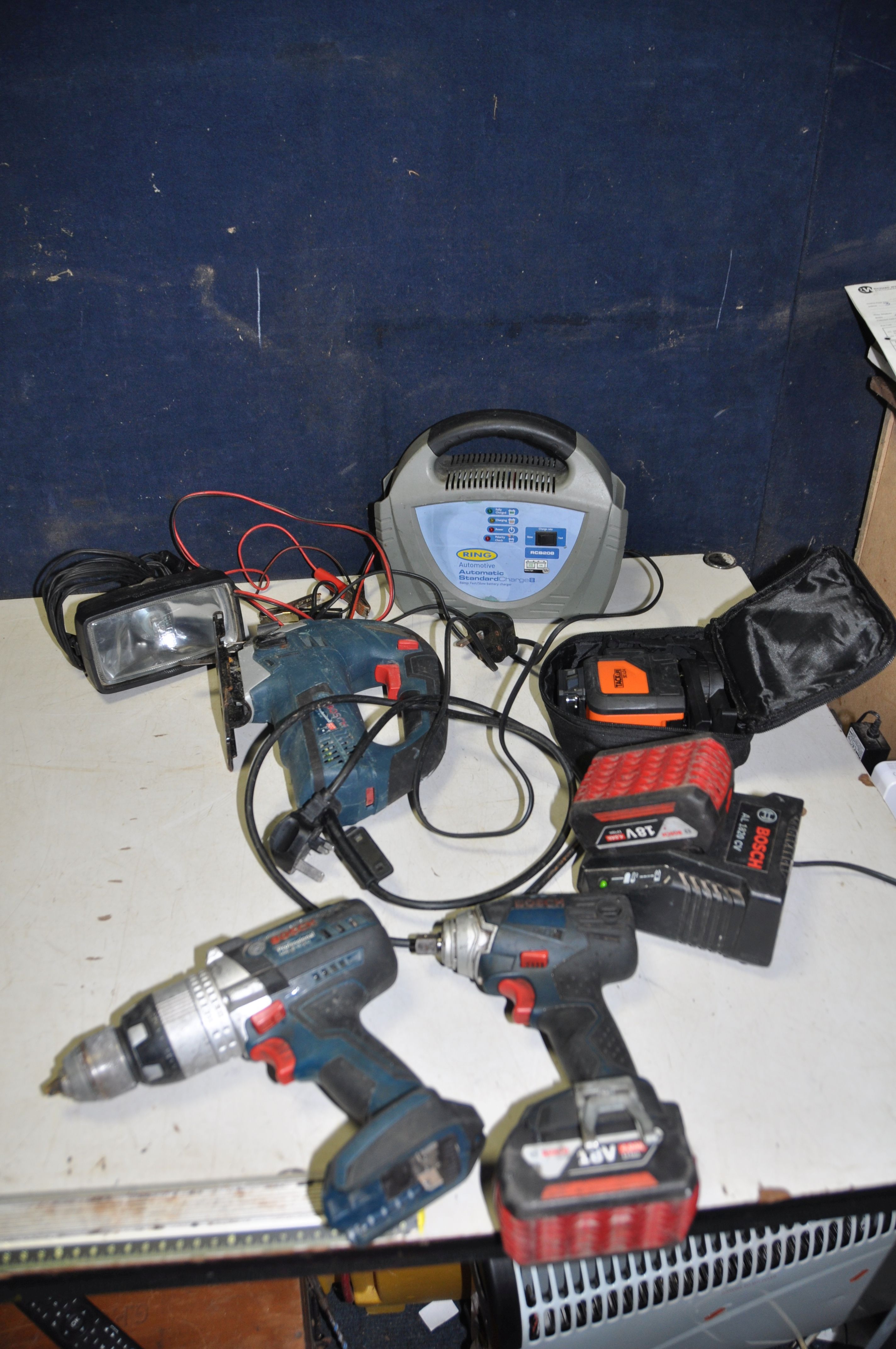 A BOSCH GSB18VE-2-LI 18V DRILL, a Bosch 18v Impact driver, two batteries and charger, a Ring Battery