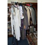 A QUANTITY OF VINTAGE LADIES' CLOTHING, to include twelve coats, mainly thick woollen examples, a