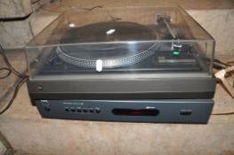 A DUAL 505 TURNTABLE with an Audio Technica stylus and a NAD C420 tuner ( both PAT pass and
