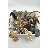 A BOX OF SILVER AND COSTUME JEWELLERY, to include a silver collar necklace with a hammer effect