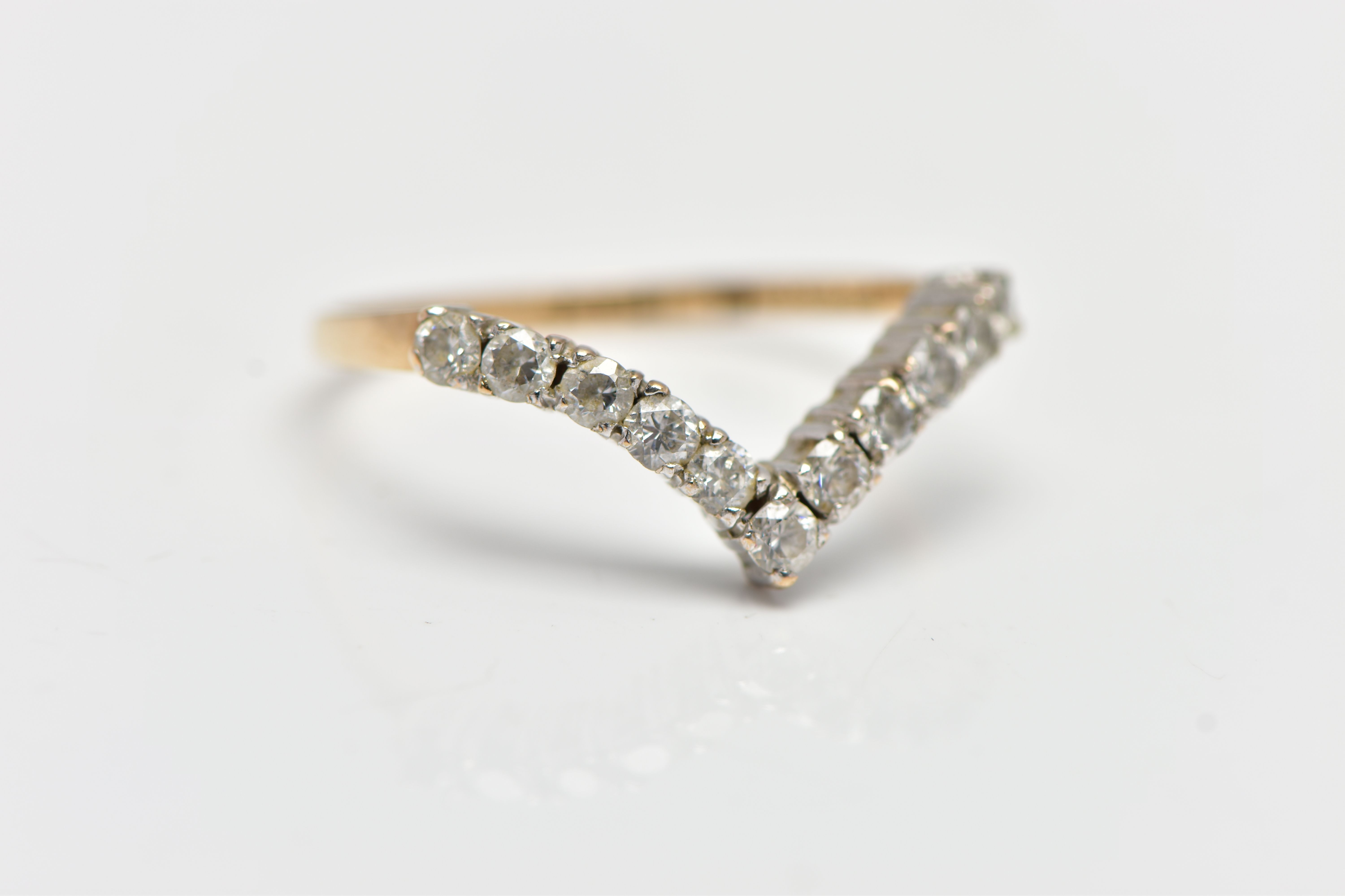A 9CT YELLOW GOLD DIAMOND WISHBONE RING, designed with a row of eleven claw set, round brilliant cut - Image 4 of 4