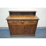 AN OAK SIDEBOARD, with a raised back, two drawers, over double cupboard doors, width 112cm x depth