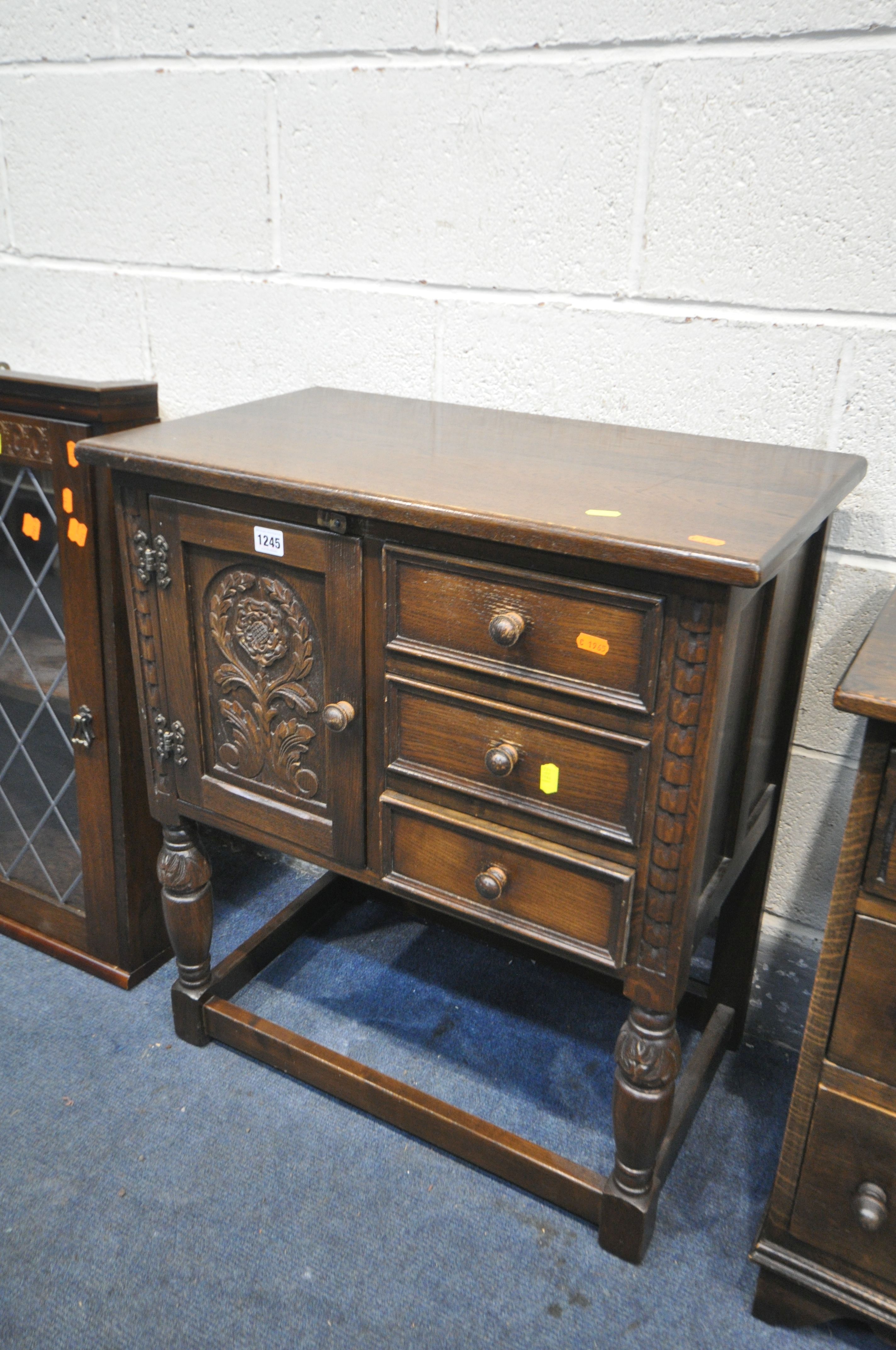 AN OAK SIDE CABINET, with a single door and three drawers, width 65cm x depth 38cm x height 73cm, - Image 2 of 3