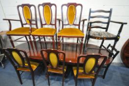 A MAHOGANY OVAL EXTENDING PEDESTAL DINING TABLE, extended length 246cm x closed length 169cm x depth