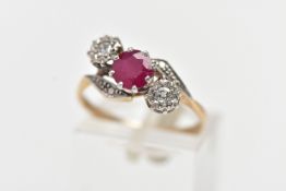 A YELLOW METAL RUBY AND DIAMOND CROSSOVER RING, centering on a circular cut ruby in an eight claw