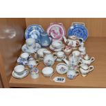 A COLLECTION OF ASSORTED MINIATURE TEAWARES, comprising a Wedgwood blue Jasper Ware coffee pot, a