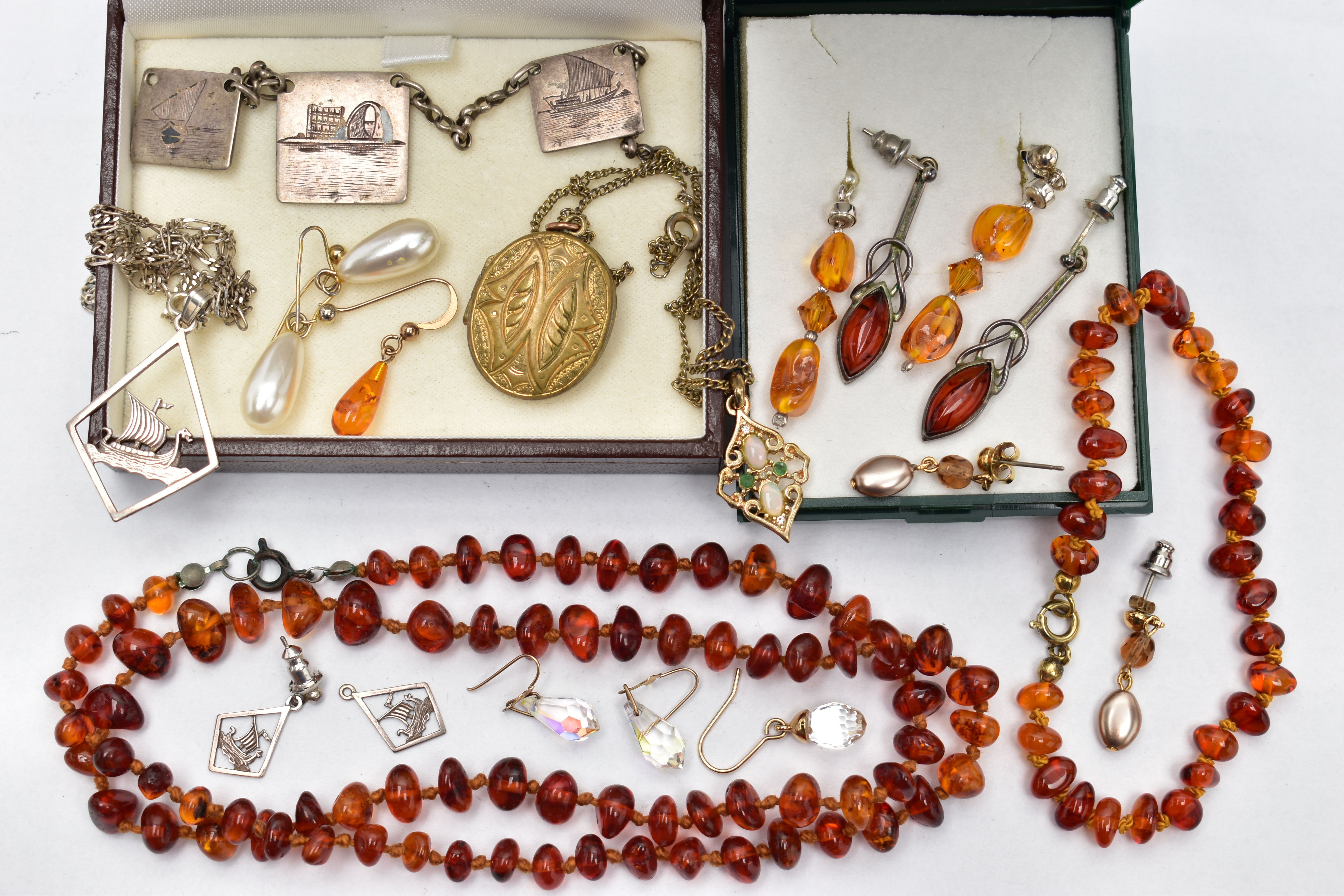 A SELECTION OF JEWELLERY, to include an amber bead bracelet, and necklace, a boxed pair of amber