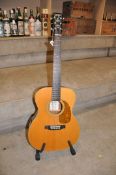 A JOHNSON GUITARS J016 ACOUSTIC GUITAR with a solid Spruce top, mahogany back and sides, Rosewood