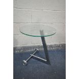A CIRCULAR GLASS TOP SIDE TABLE, on a L shaped chrome base with wheels, diameter