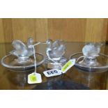 TWO LALIQUE RING / PIN TRAYS AND A LALIQUE PAPERWEIGHT, the two clear glass ring trays with a