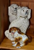 A FISCHER AND MIEG FIGURE OF A SEATED SPANIEL AND A LARGE PAIR OF SADLER STAFFORDSHIRE SPANIELS, the