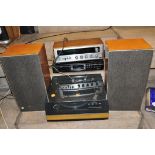 A ROTEL RX-150A VINTAGE STEREO RECEIVER with a walnut effect covering, a Garrard 86SB turntable, a