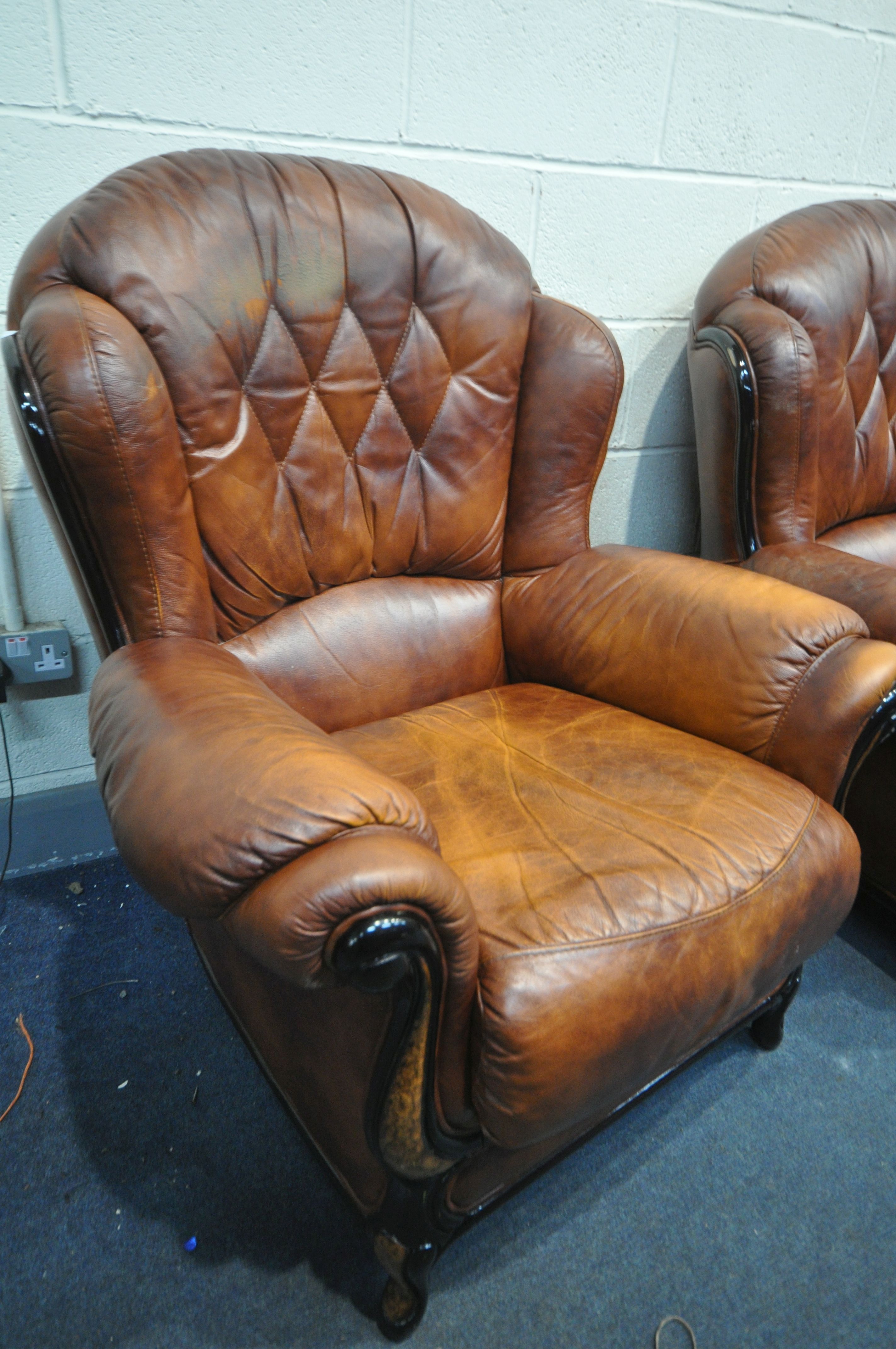 A BROWN LEATHER THREE PIECE LOUNGE SUITE, comprising a three seater sofa and a pair of armchairs ( - Image 3 of 3