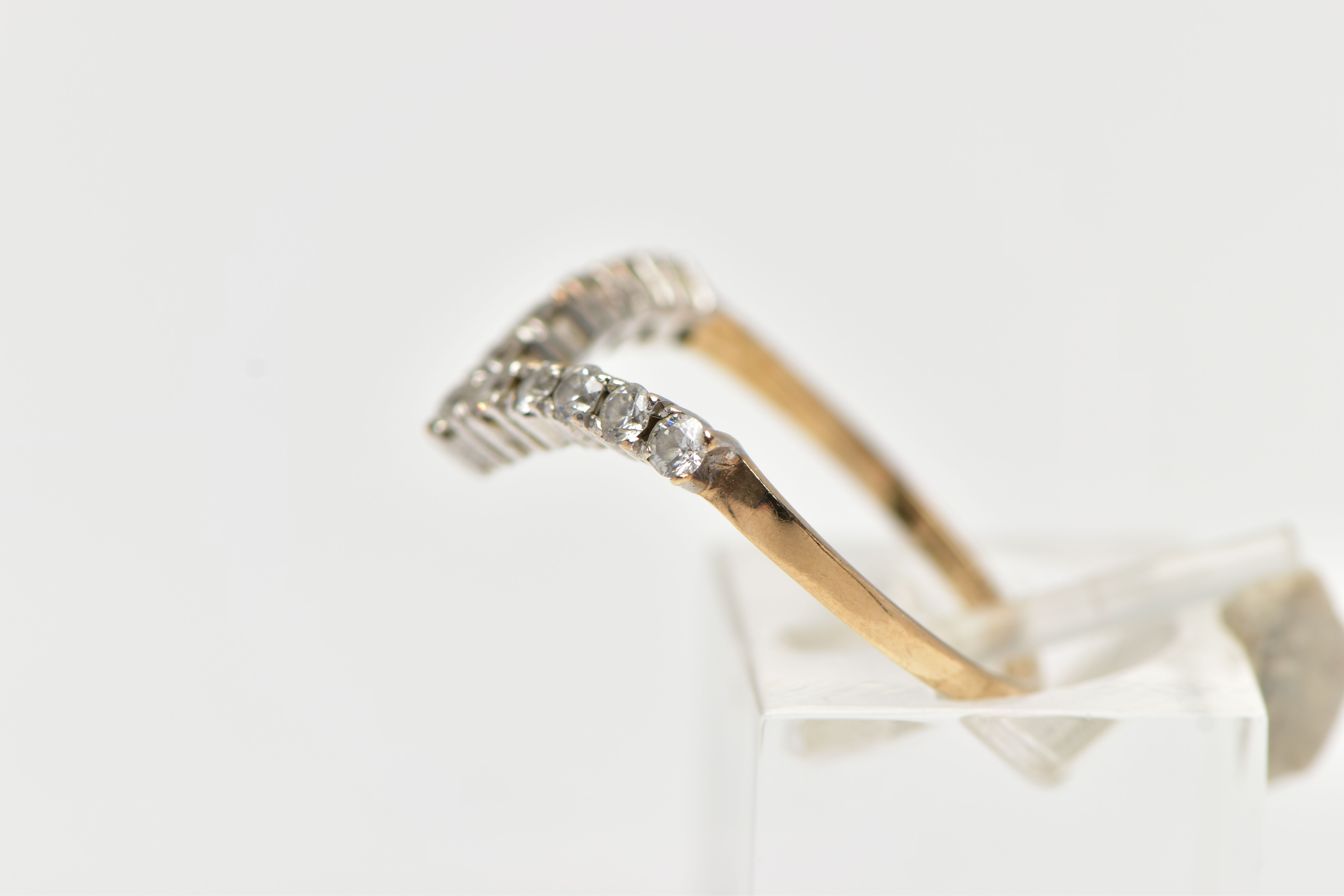 A 9CT YELLOW GOLD DIAMOND WISHBONE RING, designed with a row of eleven claw set, round brilliant cut - Image 2 of 4