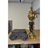A DECORATIVE ELECTRIC TABLE LAMP IN THE FORM OF AN OIL LAMP, comprising a cast brass base, reservoir