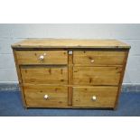 A RUSTIC PINE SIDEBOARD/CHEST OF SIX DRAWERS, width 128cm x depth 48cm x height 85cm (condition:-