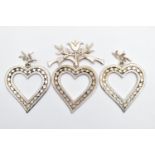 A LARGE WHITE METAL HEART BROOCH AND MATCHING EARRINGS, large openwork hearts with diamond pattern