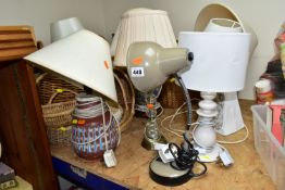 EIGHT ASSORTED TABLE LAMPS AND A QUANTITY OF WICKER BASKETS, the lamps mostly ceramic based, all