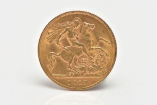 AN EARLY 20TH CENTURY HALF SOVEREIGN COIN, obverse depicting George V, reverse depicting George