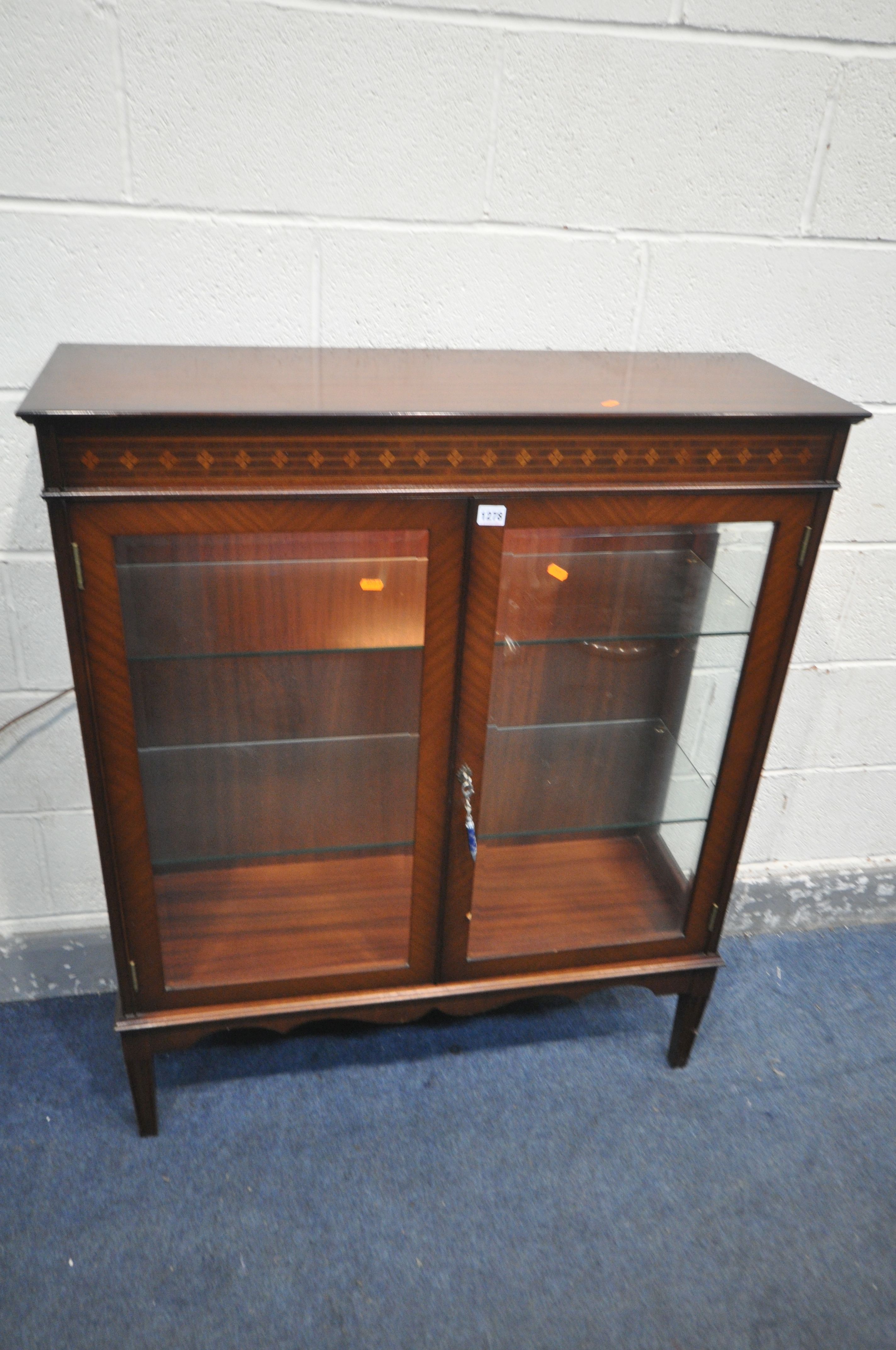 A MAHOGANY GLAZED TWO DOOR DISPLAY CABINET, with two glass shelves, width 95cm x depth 33cm x height