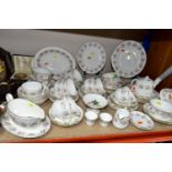 A MINTON 'SPRING BOUQUET' PATTERN PART DINNER SERVICE, comprising six dinner plates (one second),