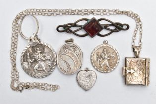 A SMALL BAG OF JEWELLERY, to include two circular St. Christopher pendants, one signed 'Georg