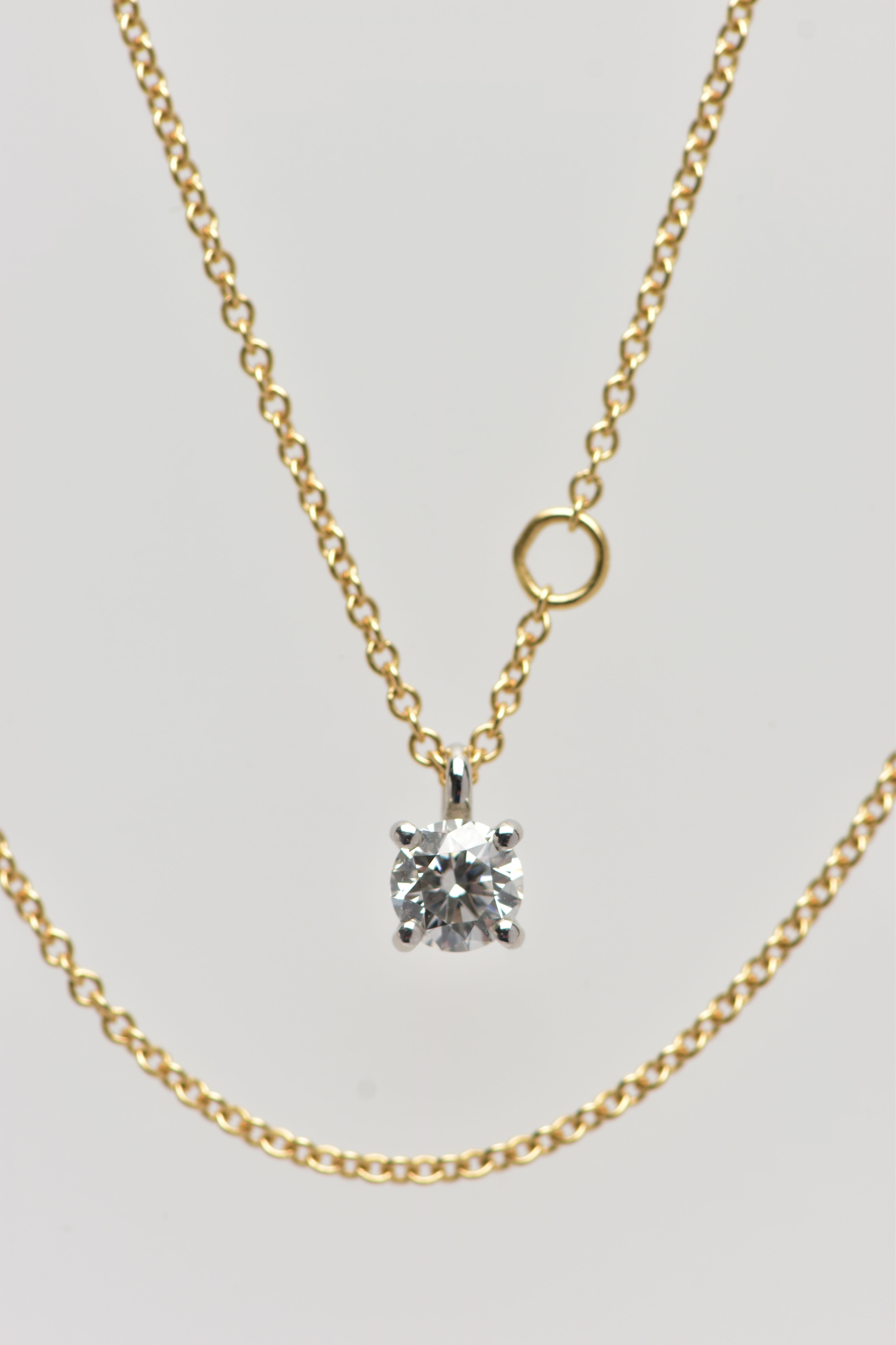 AN 18CT YELLOW AND WHITE GOLD TIFFANY & CO DIAMOND PENDANT NECKLACE, set with a round brilliant - Image 5 of 6