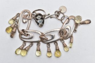 A GEM SET BRACELET AND A MOONSTONE RING, the bracelet designed with four openwork oval links,