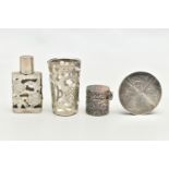 FOUR WHITE METAL ITEMS, to include a glass cup with an openwork white metal floral case,