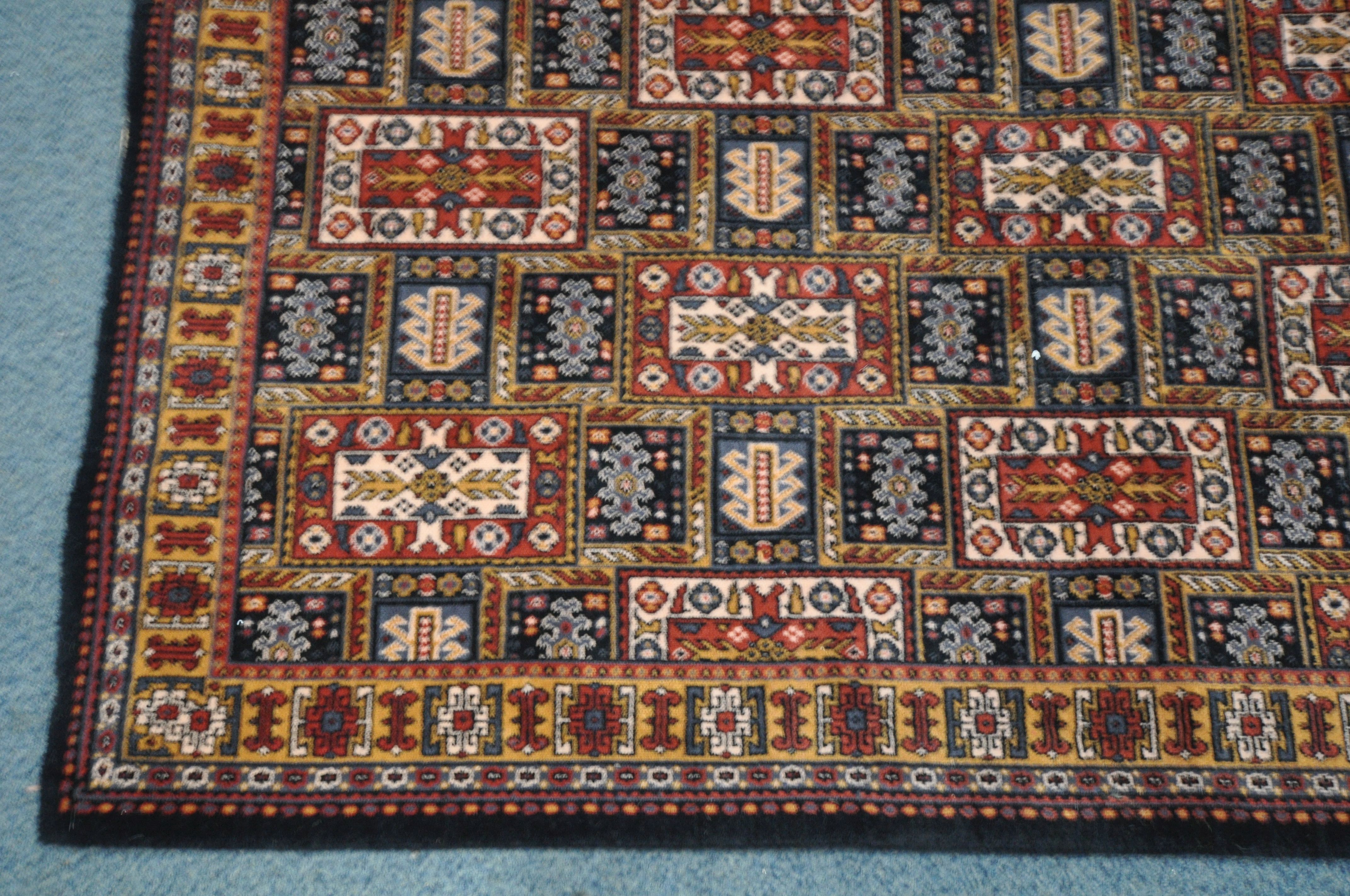 A GROSVENOR 100% WOOLLEN CARPET SQUARE, of a multicolour design in a geometric style, 366cm x - Image 3 of 4