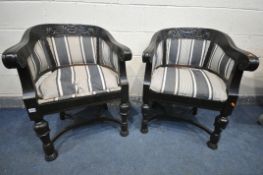 A PAIR OF EBONISED CARVED OAK TUB CHAIRS, with stripped fabric, with acanthus front legs, united