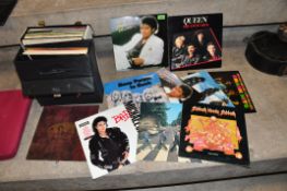 TWO CASES CONTAINING SIXTY LPs, 12in AND 7in SINGLES including Abbey Road ( 1st Pressing) and Love