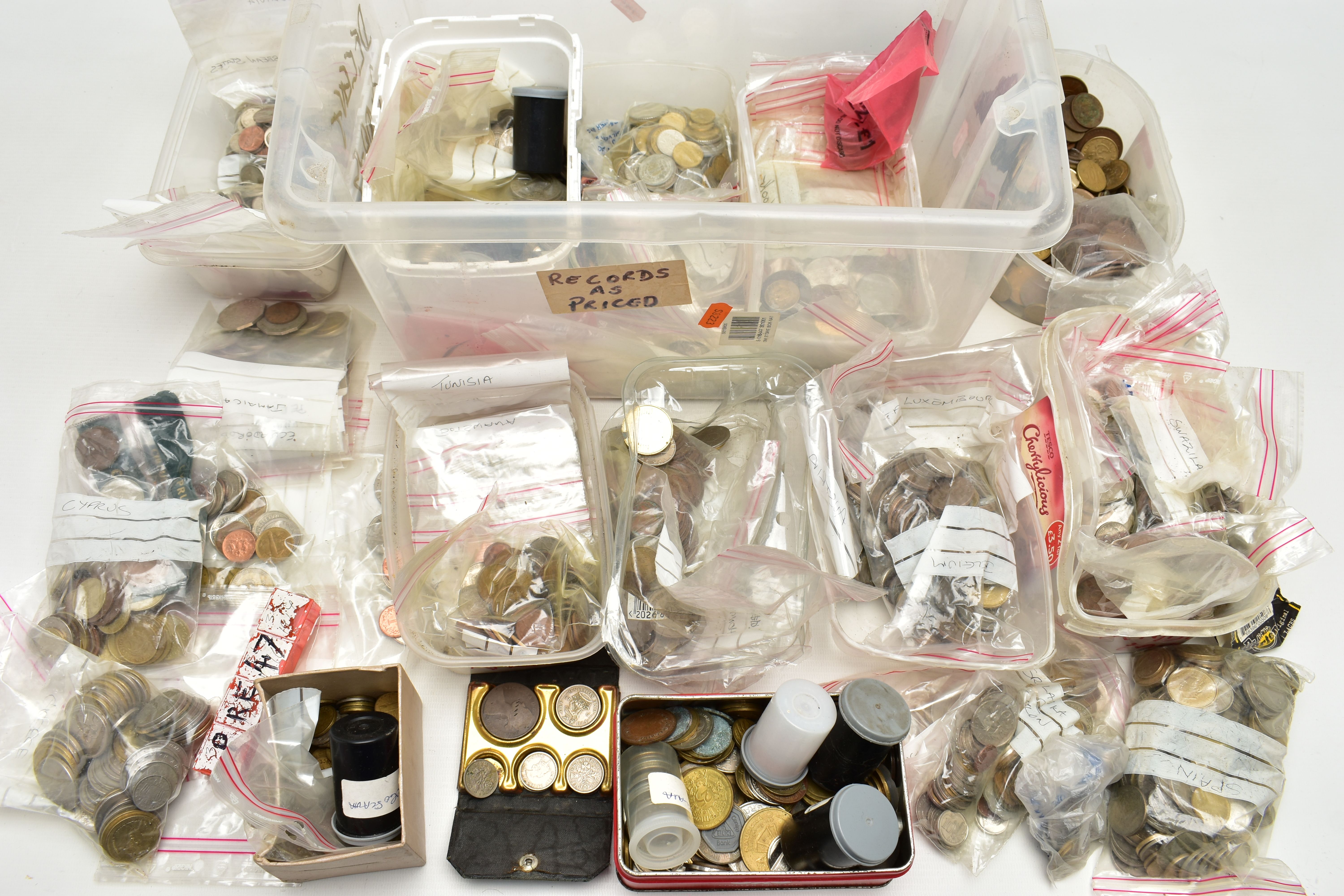 A LARGE AND HEAVY PLASTIC BOX OF WORLD COINS, to include low value coinage from most of the European
