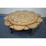 AN ANGLO-INDIAN HARDWOOD AND BONE INLAID COFFEE TABLE, with a decorated border, on four shaped legs,