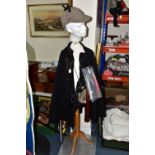 POLICE INTEREST: A POLICE OFFICER'S CAPE, A STRAITJACKET AND OTHER ITEMS OF CLOTHING WITH MANNEQUIN,