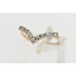 A 9CT YELLOW GOLD DIAMOND WISHBONE RING, designed with a row of eleven claw set, round brilliant cut
