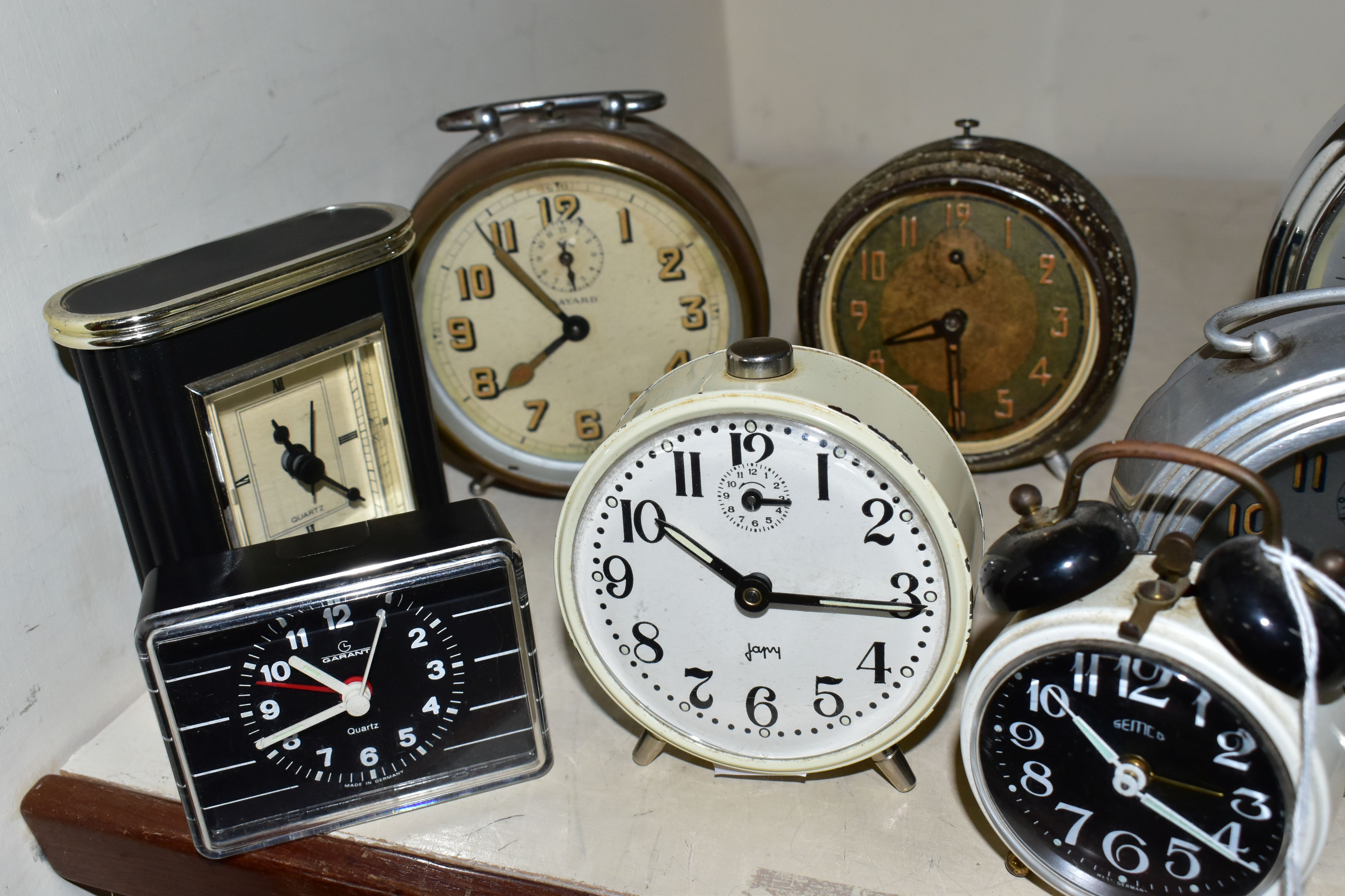 A COLLECTION OF NINE VINTAGE BEDSIDE ALARM CLOCKS, comprising three Jaz French alarm clocks, an - Image 4 of 5