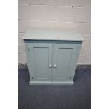 A TEAL PAINTED PINE TWO DOOR CABINET, enclosing two adjustable shelves, width 85cm x depth 46cm x