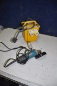 A MAKITA 9557NBR 110V ANGLE GRINDER missing two disc nuts) and a 110 volt transformer (2) ( PAT pass