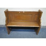 A PINE PEW, that appears to be adapted from various items and later alterations, length 121cm x